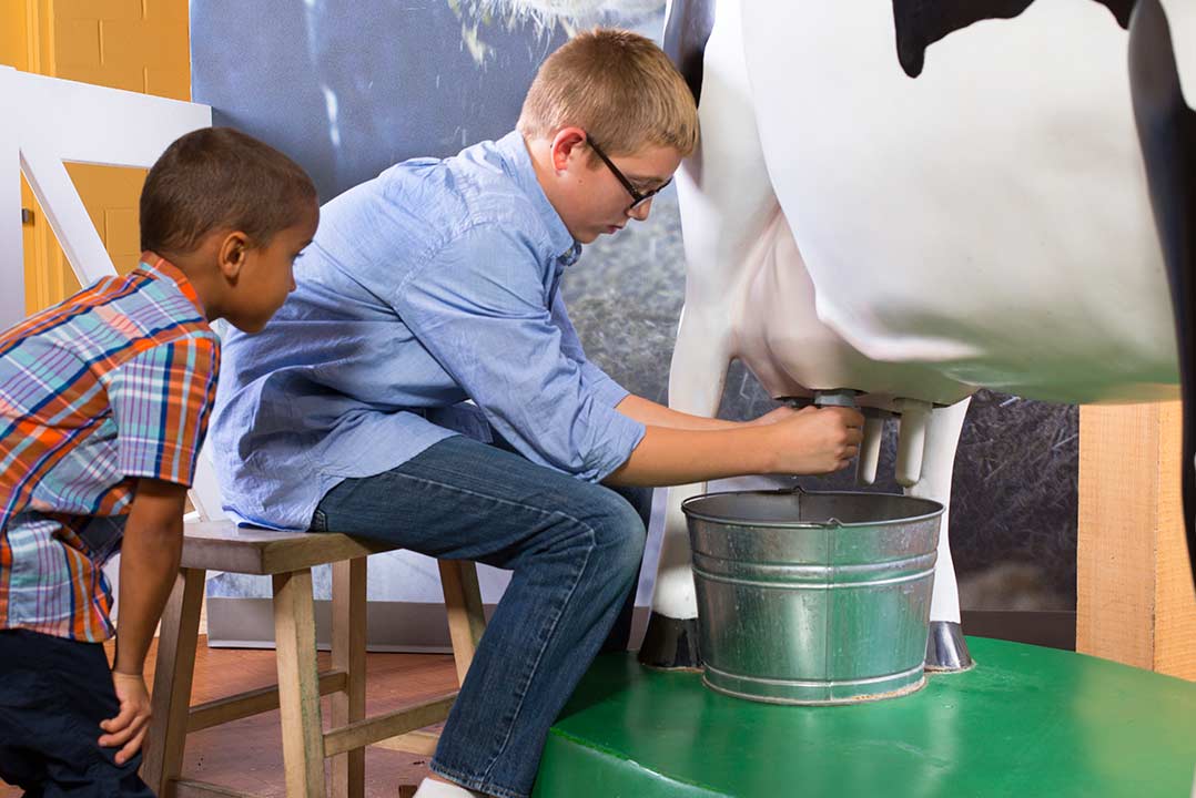 Kids Milking Cow demo image